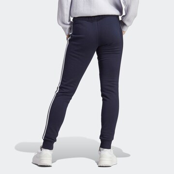 ADIDAS SPORTSWEAR - Tapered Calças de desporto 'Essentials' em azul