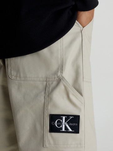 Calvin Klein Jeans Normální Kalhoty – béžová