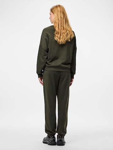 PIECES Zúžený strih Nohavice 'PCRISSO' - Zelená