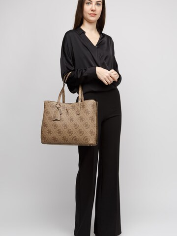 GUESS Shoulder bag 'Meridian' in Brown: front