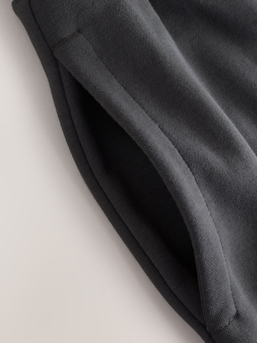 Next - Tapered Pantalón en gris