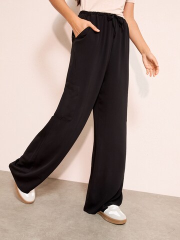 Wide leg Pantaloni di Friends Like These in nero