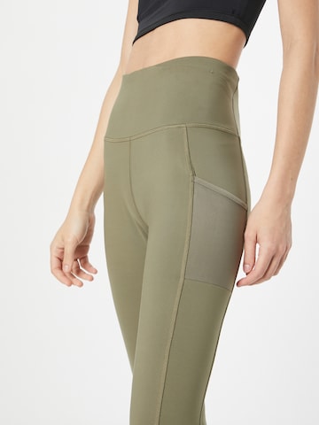 COLUMBIA Skinny Športne hlače 'Windgates' | zelena barva