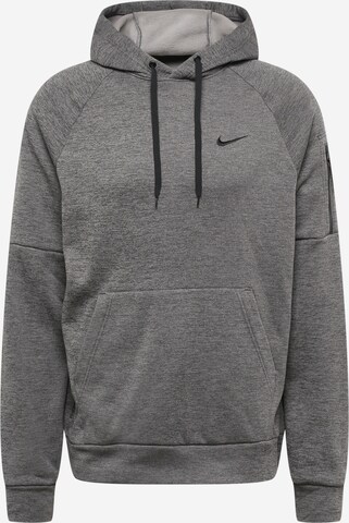 NIKE - Camiseta deportiva en gris: frente