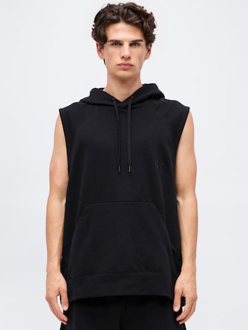 NIKE Spordidressipluusid 'NAC', värv must: eest vaates