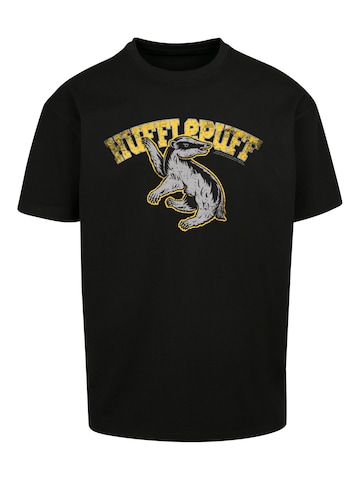 F4NT4STIC Shirt 'Harry Potter Hufflepuff Sport Emblem' in Zwart: voorkant