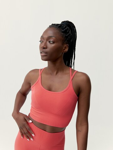 Born Living Yoga Sporttop ' Dana ' in Oranje: voorkant