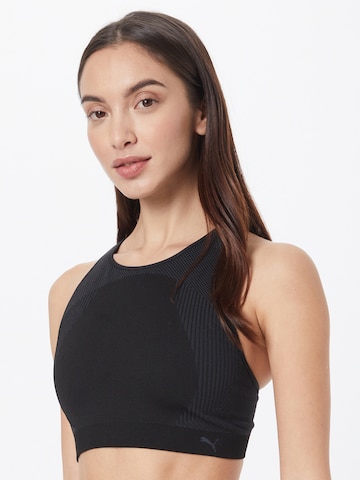 PUMA Bralette Sports Bra in Black: front