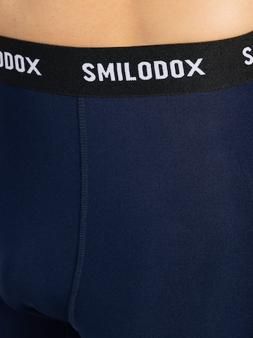 Skinny Pantalon de sport ' Zeyn ' Smilodox en bleu