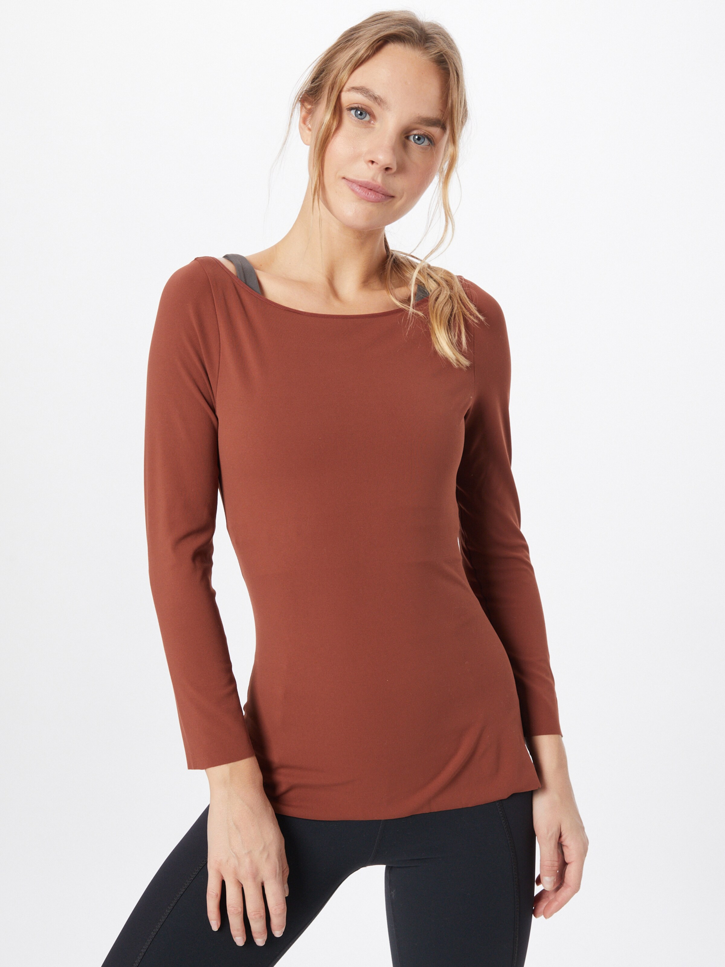 Frauen Sportbekleidung NIKE Shirt 'Yoga Luxe' in Rostbraun - ZN61245