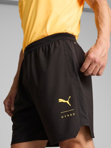 PUMA Voľný strih Športové nohavice 'HYROX x PUMA Fuse' - Čierna
