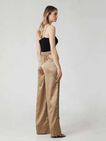 Guido Maria Kretschmer Women Wide leg Pants 'Sina' in Gold: back