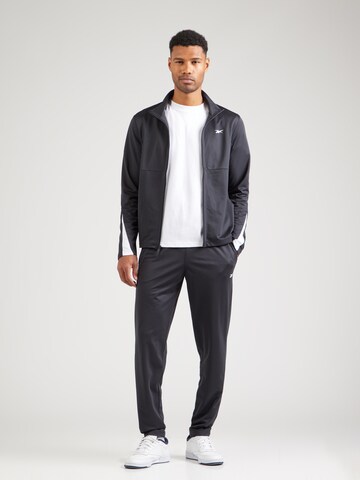 Completo per l'allenamento 'Poly' di Reebok in nero