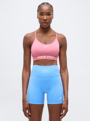NIKE - Soutien Bustier Soutien de desporto 'Nike Pro' em rosa: frente