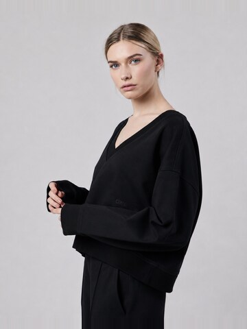 OWN Off With NatureSweater majica 'Felpa Scollo a V Loose Fit in Interlock Black' - crna boja