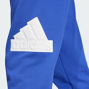 Effilé Pantalon de sport 'Future Icons Badge of Sport' ADIDAS SPORTSWEAR en bleu