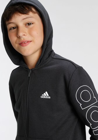 Bluză cu fermoar sport 'Essentials' de la ADIDAS SPORTSWEAR pe negru