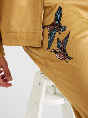 Carhartt WIP Loosefit Hose 'Ducks Single Knee' in Braun