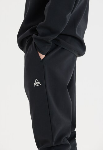 SOS Tapered Trousers 'Vail' in Black