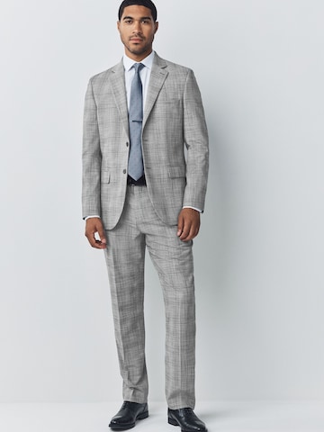 Regular Pantalon à plis 'Motionflex' Next en gris