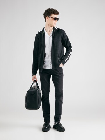 Slimfit Jeans 'James' di Mavi in grigio