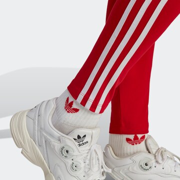 Skinny Leggings 'Adicolor Classics' di ADIDAS ORIGINALS in rosso