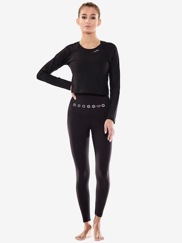 Skinny Pantaloni sportivi 'HWL112C' di Winshape in nero