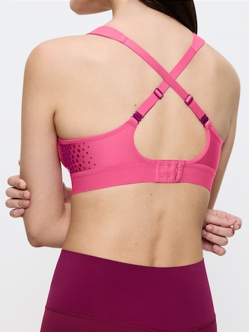 Triumph Triaction T-shirt Sports bra ' Triaction Hybrid Lite ' in Pink