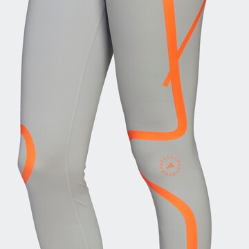 Skinny Pantaloni sportivi di ADIDAS BY STELLA MCCARTNEY in grigio