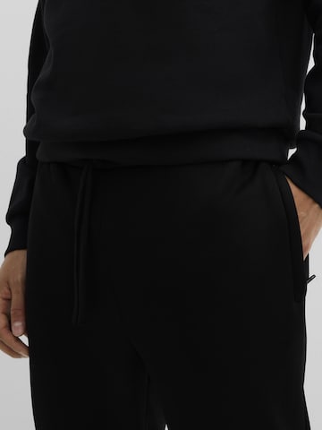 Effilé Pantalon bonprix en noir