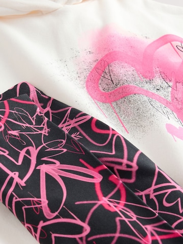 Set Next en rose