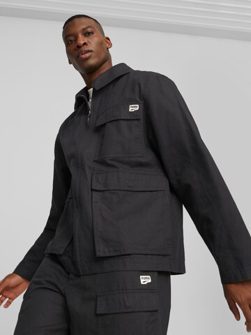 PUMA Between-Season Jacket in Black: front