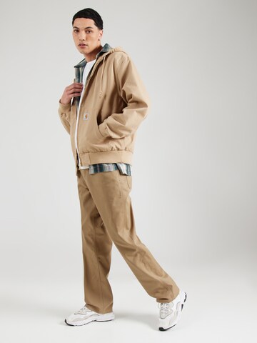 Loosefit Pantaloni di Carhartt WIP in marrone