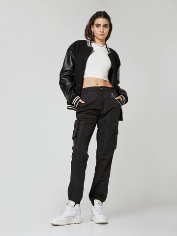 About You x Nils Kuesel Tapered Pants 'Iven' in Black