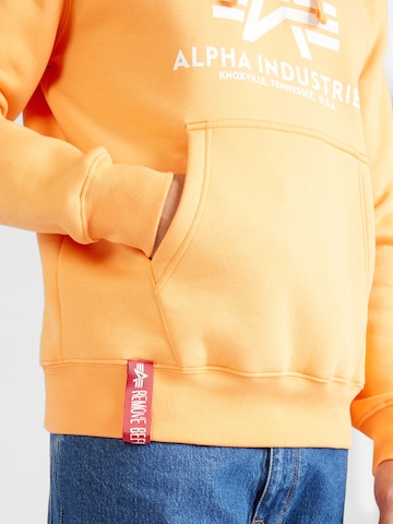 ALPHA INDUSTRIES Sweatshirt in Oranje