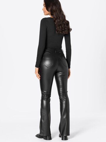 évasé Pantalon River Island en noir