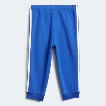 Skinny Completo per l'allenamento 'Badge Of Sport French Terry' di ADIDAS SPORTSWEAR in blu