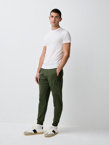 Tapered Pantaloni di Next in verde