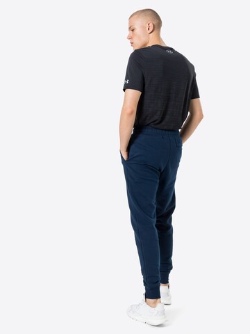 UNDER ARMOUR Tapered Sportbroek 'Rival' in Blauw