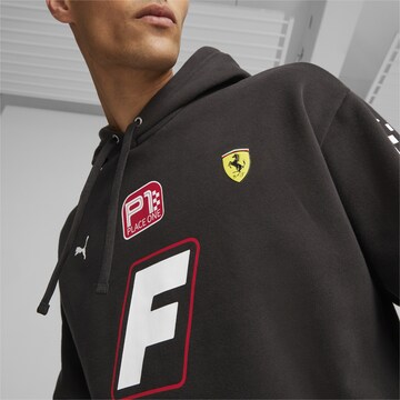 PUMA Sportsweatshirt 'Scuderia Ferrari Race Garage' in Zwart