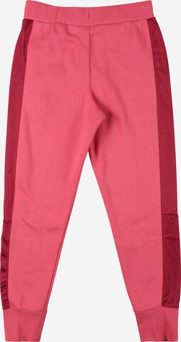 Effilé Pantalon 'Icon Clash' Nike Sportswear en rose