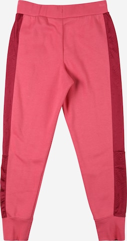 Tapered Pantaloni 'Icon Clash' de la Nike Sportswear pe roz