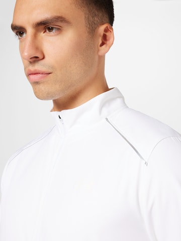 Veste de sport 'Storm' UNDER ARMOUR en blanc