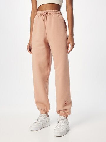 ADIDAS BY STELLA MCCARTNEY Tapered Workout Pants in Pink: front