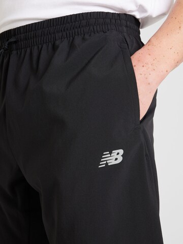 new balance Конический (Tapered) Спортивные штаны 'Essentials Active' в Черный