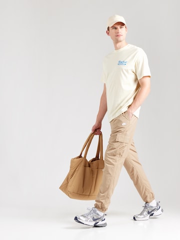 Tricou funcțional 'BOARD BAKERY' de la RIP CURL pe galben