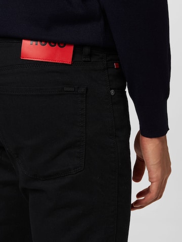 HUGO Red Slimfit Jeans 'HUGO 708' i sort