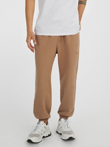 Young Poets Tapered Pants 'Maleo' in Brown: front
