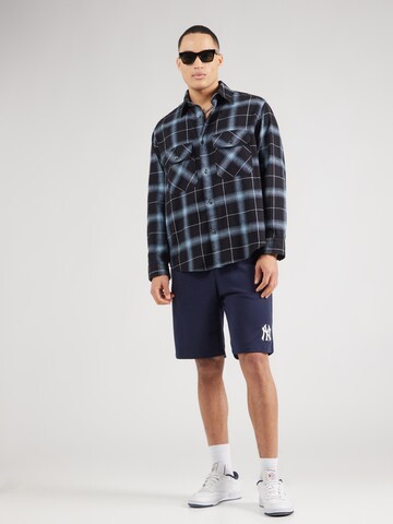 Champion Authentic Athletic Apparel Loosefit Byxa i blå