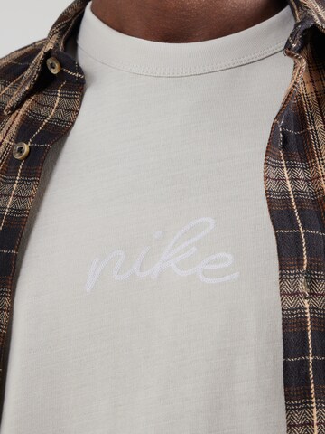 Maglietta 'ESS' di Nike Sportswear in beige